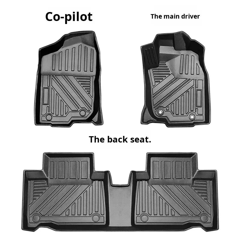 Custom-fit TPE floor mats installed in a vehicle interior