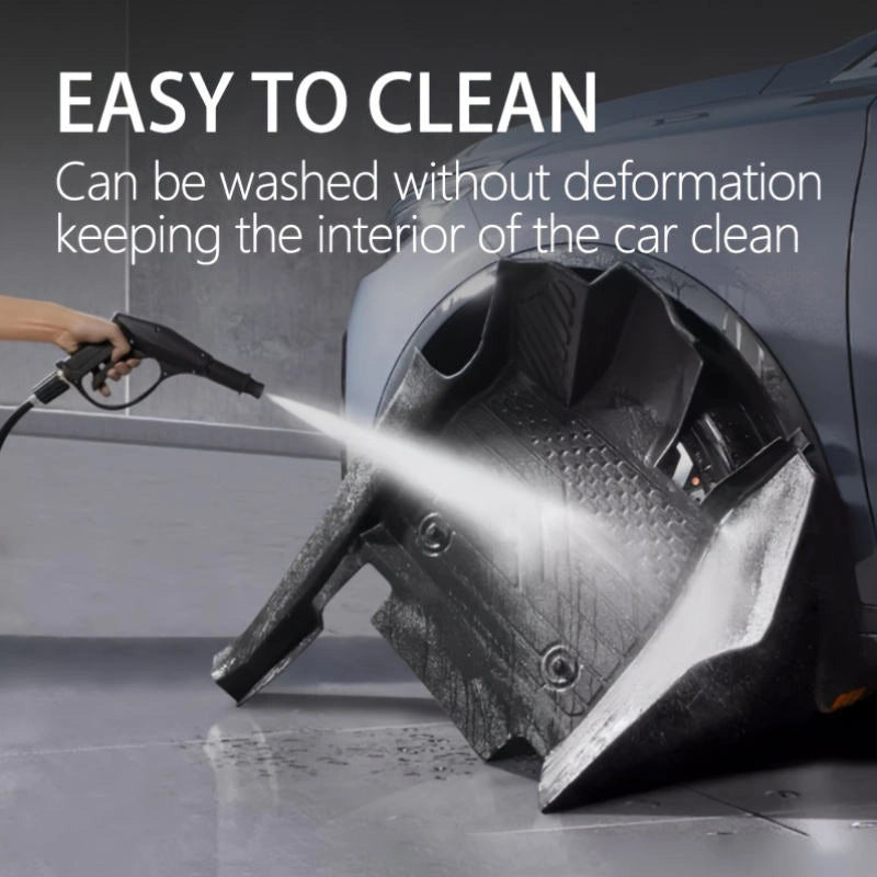 Easy-clean TPE car mats being rinsed with water