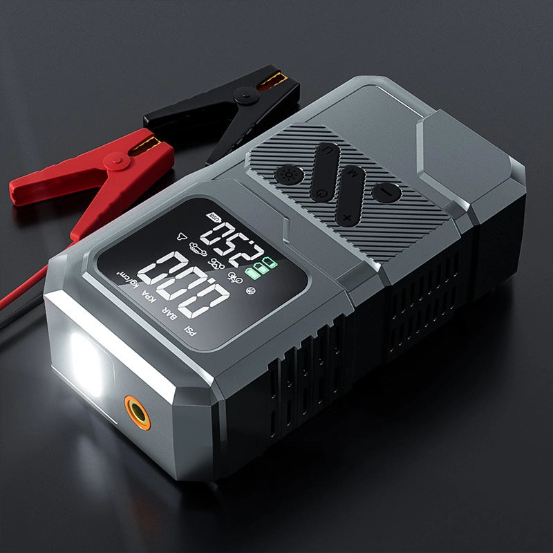 Portable air compressor inflating a car tyre